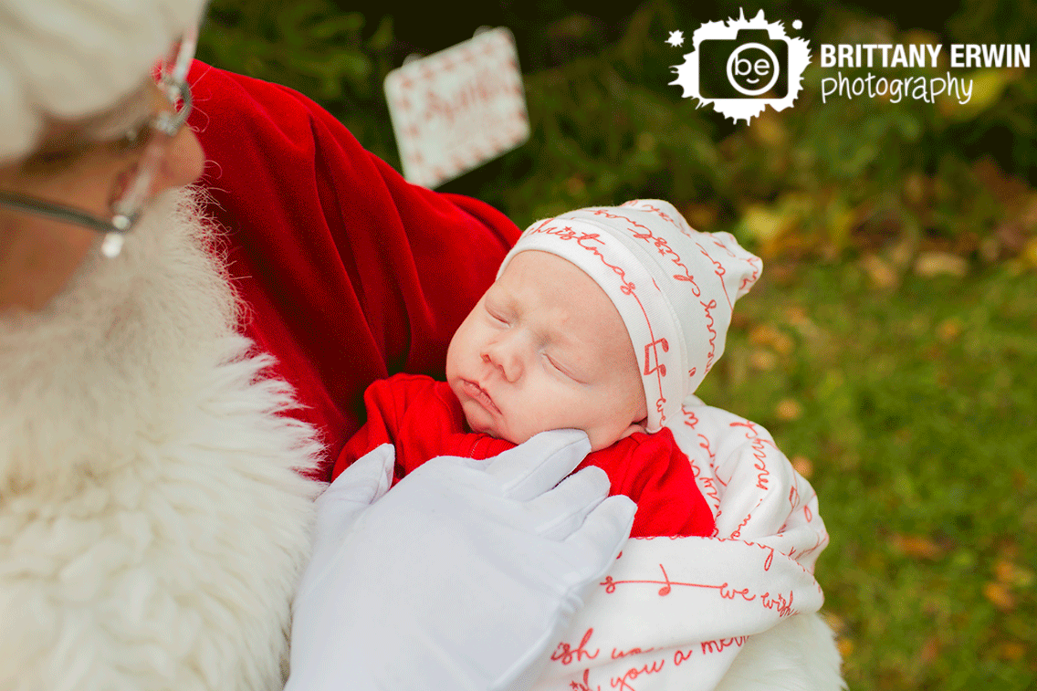 Indianapolis-christmas-mini-session-santa-with-baby-wrapped-in-blanket.gif