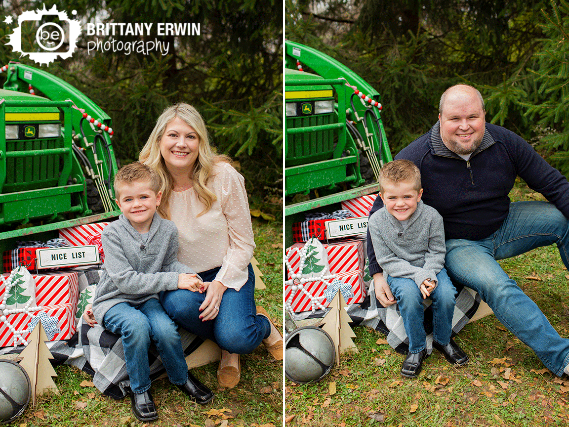 Indianapolis-christmas-mini-session-father-mother-son-portrait-with-presents-in-bucket.gif