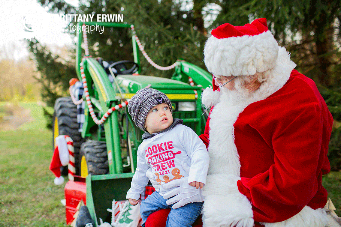 cookie-baking-crew-tshirt-baby-boy-with-Santa-outdoor-christmas-mini-session.gif