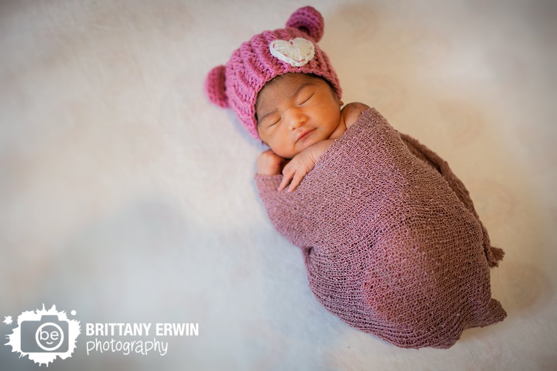 Indianapolis-newborn-portrait-photographer-baby-girl-swaddled-pink-wrap.jpg