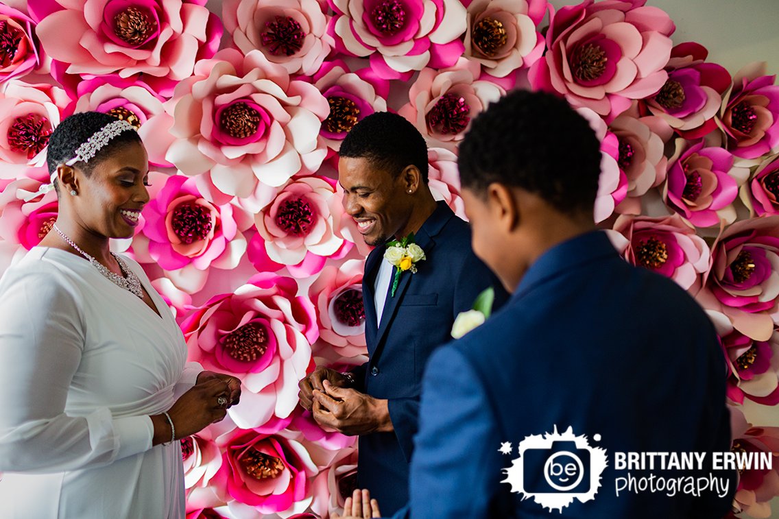 bride-and-groom-with-rings-elopement-photographer.jpg