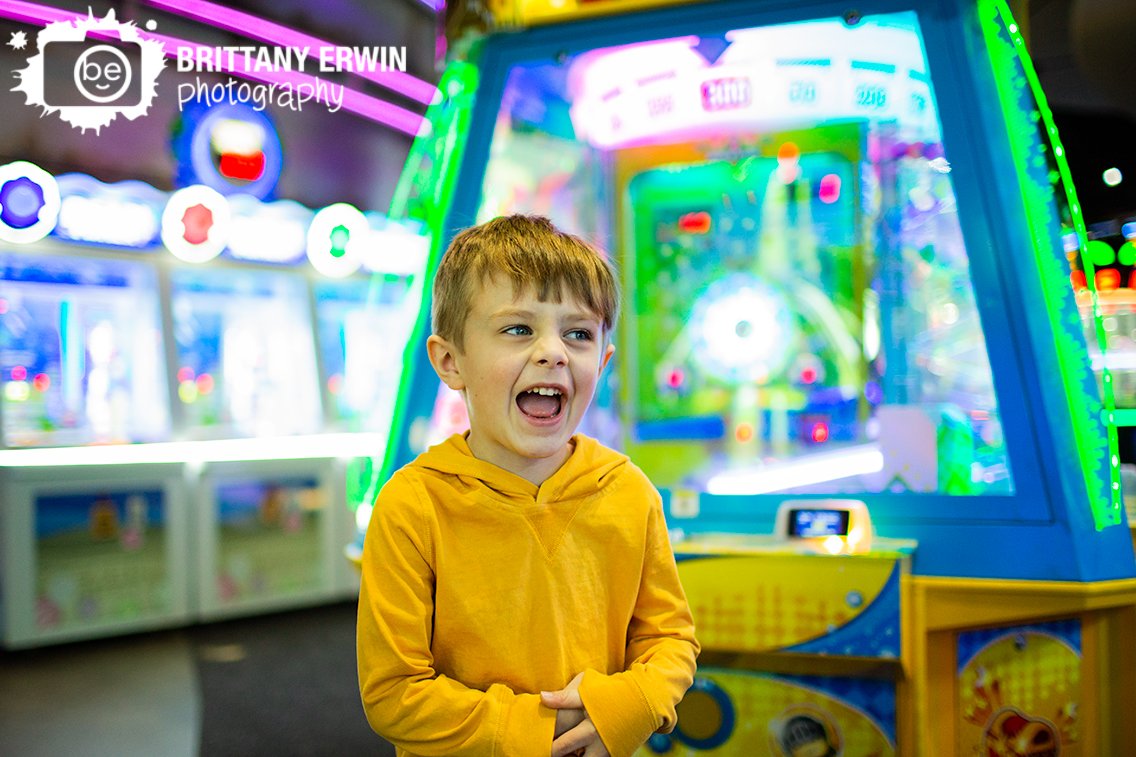 Indianapolis-portrait-photographer-boy-with-arcade-machines.jpg