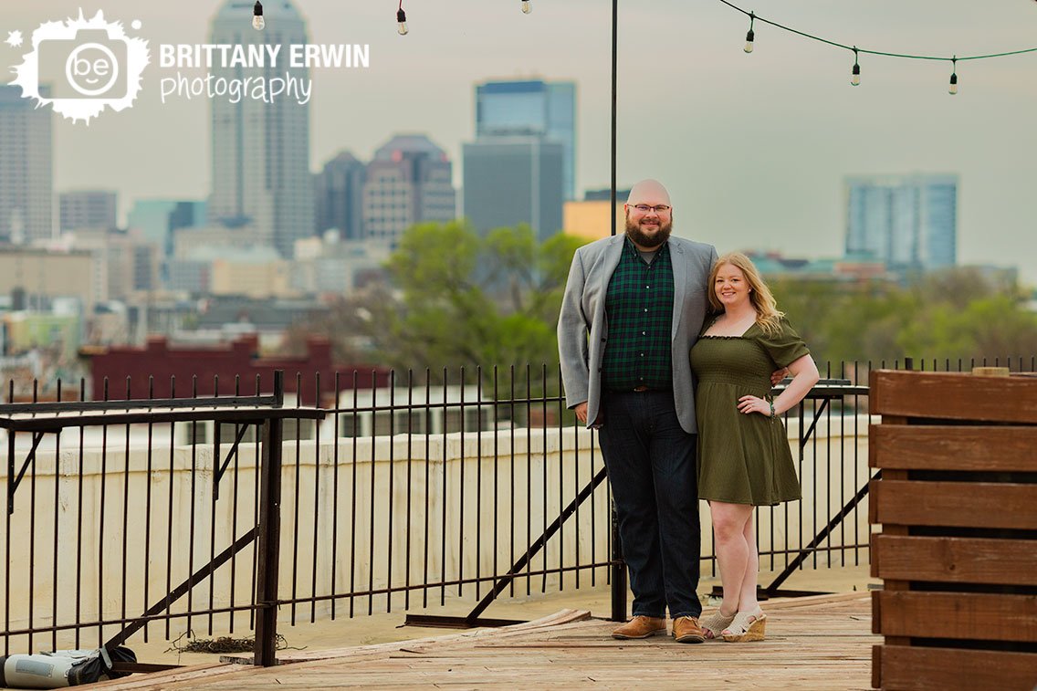 Indianapolis-skyline-engagement-portrait-photographer-couple-on-rooftop.jpg