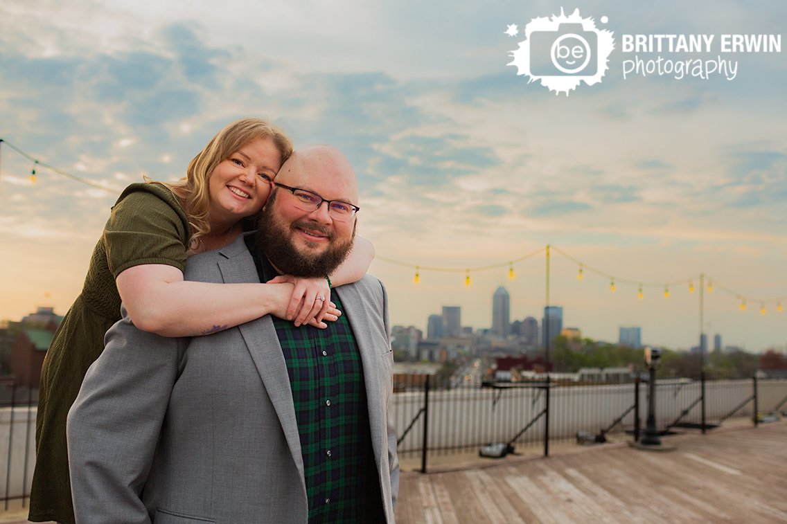 Indianapolis-skyline-engagement-portrait-photographer-couple-on-rooftop-in-Fountain-Square.jpg