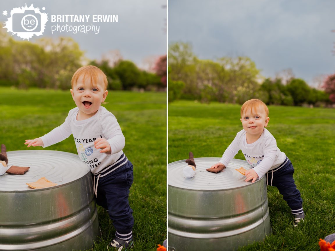 Indianapolis-portrait-photographer-baby-boy-first-birthday-playing-with-toy-smore-set.jpg