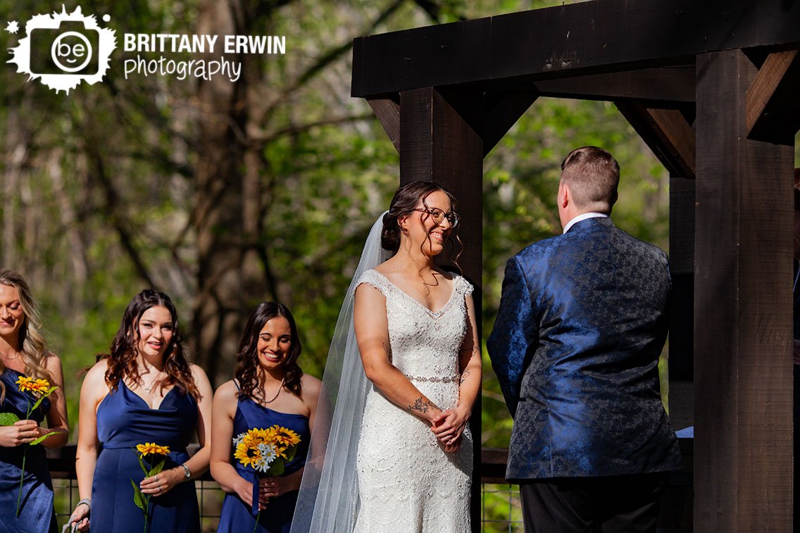 outdoor-wedding-ceremony-photographer-couple-at-altar.jpg