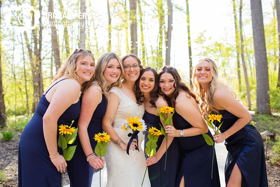 bride-with-bridesmaids-sunflower-nature-setting.jpg