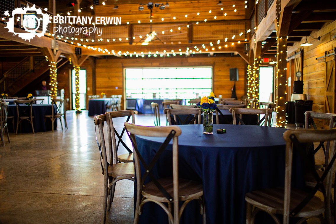 3-fat-labs-wedding-reception-blue-tablecloth-with-rustic-wood-chairs-and-twinkle-lights.jpg