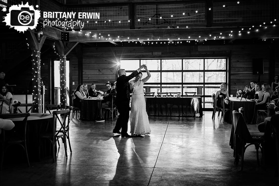 first-dance-wedding-photographer-couple-dancing-with-twirl.jpg