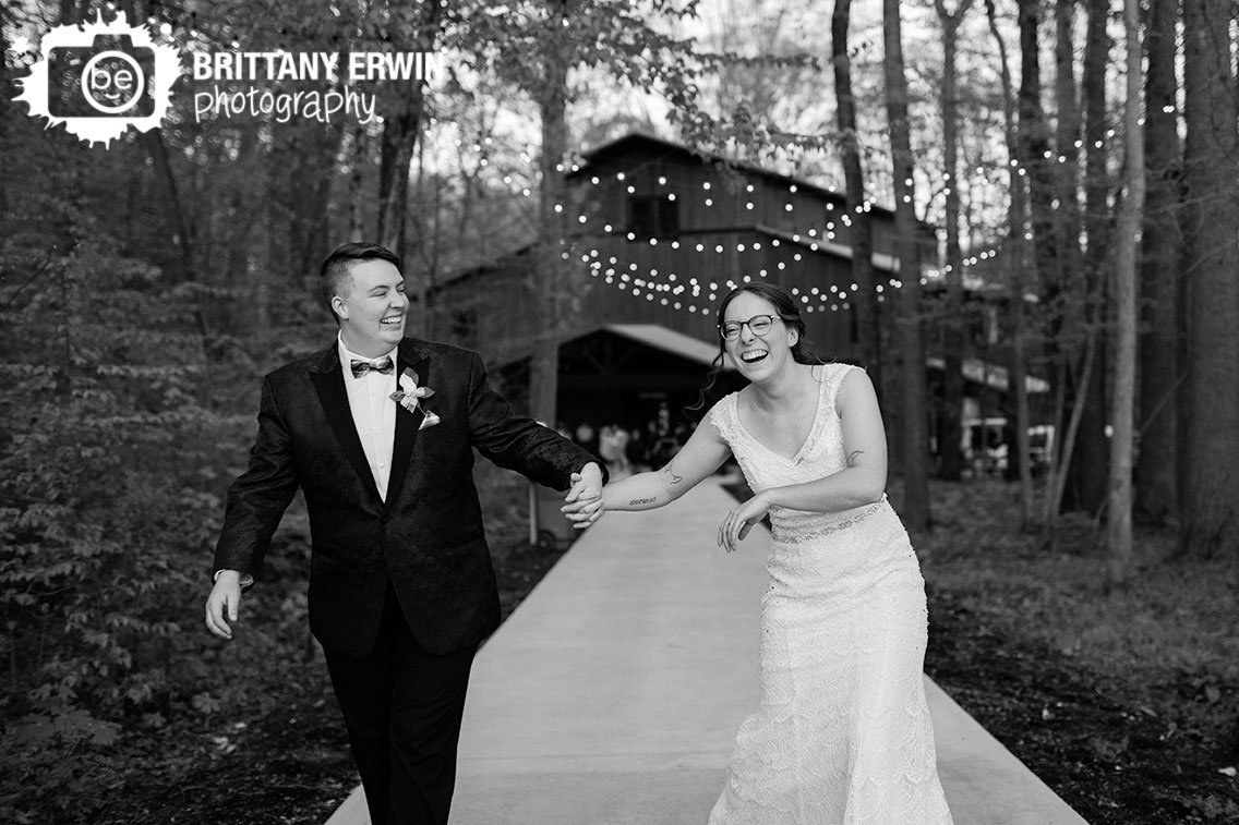 3-Fat-Labs-bridal-portrait-couple-laughing-walking-down-path.jpg