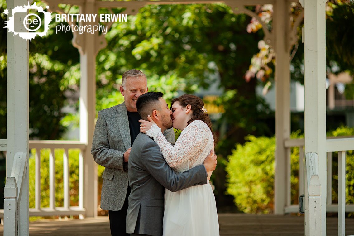 Indiana-elopement-wedding-photographer-couple-first-kiss-at-altar-gazebo.jpg