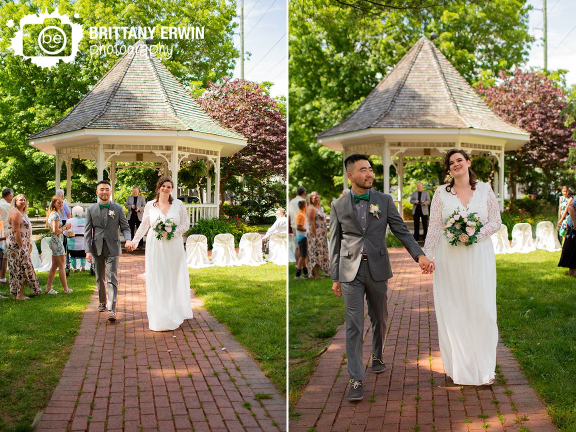 couple-exit-down-aisle-announced-husband-and-wife.jpg