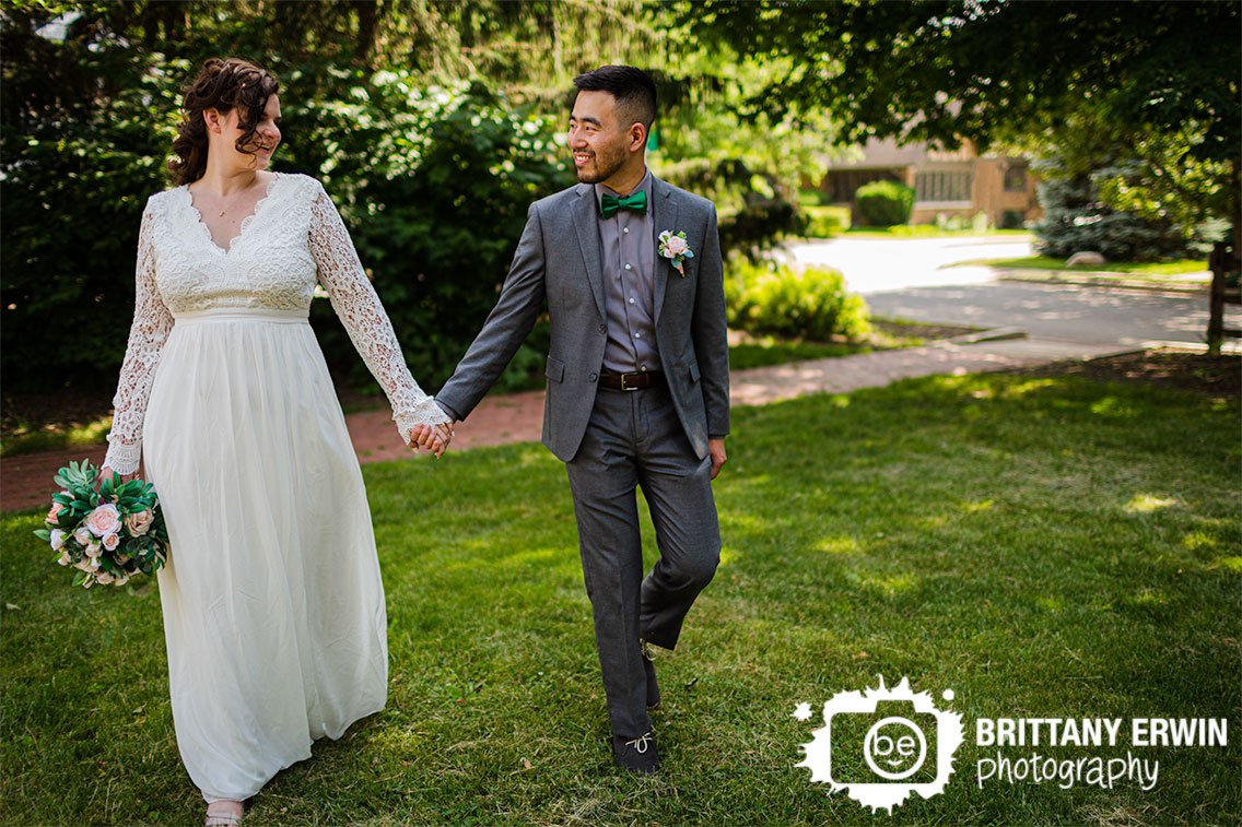 couple-walking-through-park-in-Zionsville-Indiana-elopement-photographer.jpg