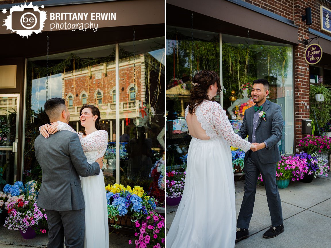 couple-dancing-on-sidewalk-in-Zionsville-at-the-flower-shop-plants-outside.jpg