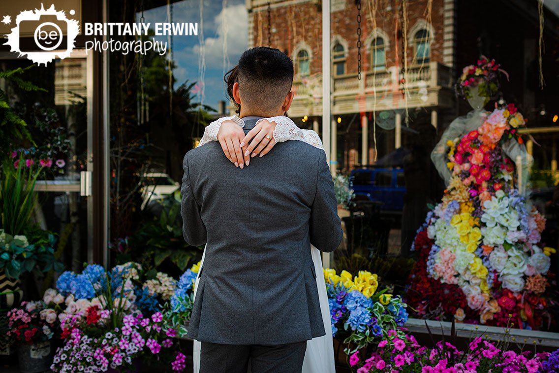 couple-dancing-outside-flower-shop-Zionsville-Indiana-photographer-elopement-floral-dress.jpg