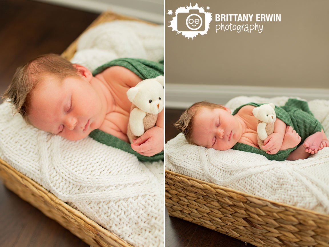 newborn-baby-boy-sleeping-in-basket-with-tiny-stuffed-bear-and-green-swaddle.jpg