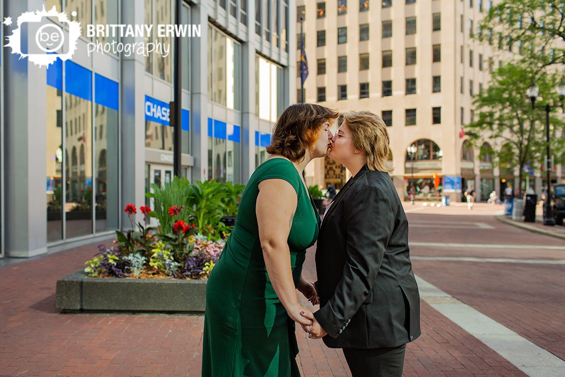 downtown-Indianapolis-couple-kiss-on-monument-circle-brick-path.jpg