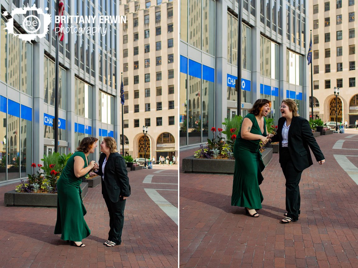 couple-downtown-Indianapolis-Indiana-laughing-on-monument-circle-brick-walkway.jpg
