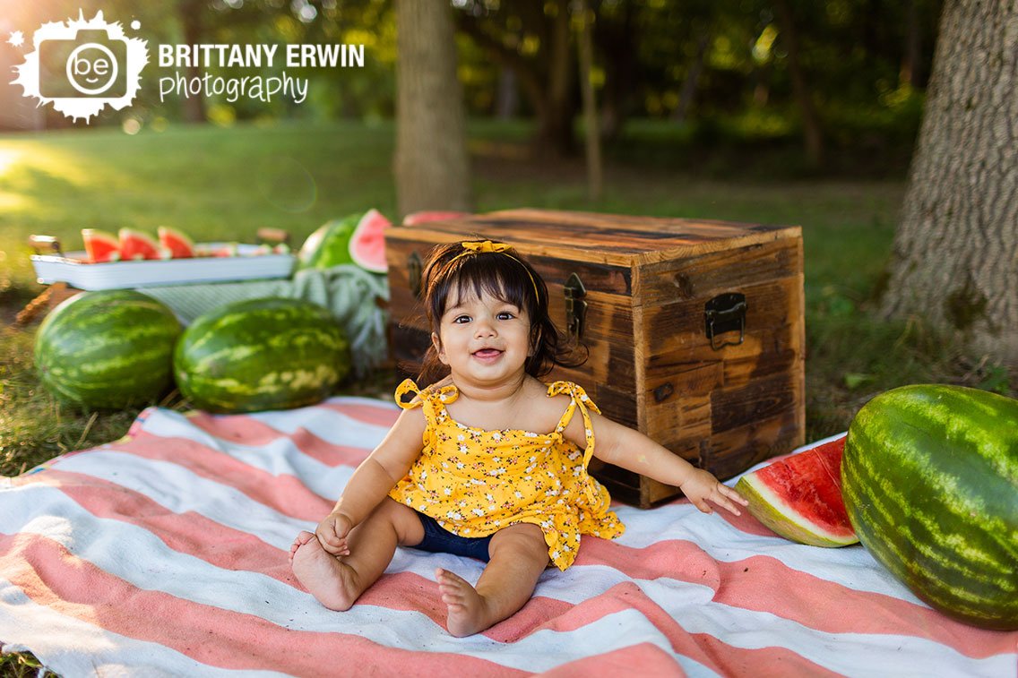 Baby-girl-yellow-floral-dress-with-picnic-blanket-watermelon.jpg
