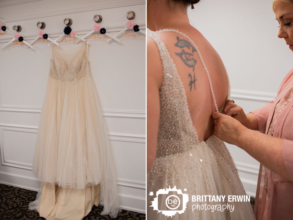 Indianapolis-wedding-photographer-bride-getting-ready-dress-hanging-with-custom-hangers.jpg