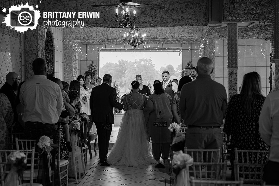 groom-reaction-as-bride-walks-down-aisle-at-wedding-ceremony.jpg