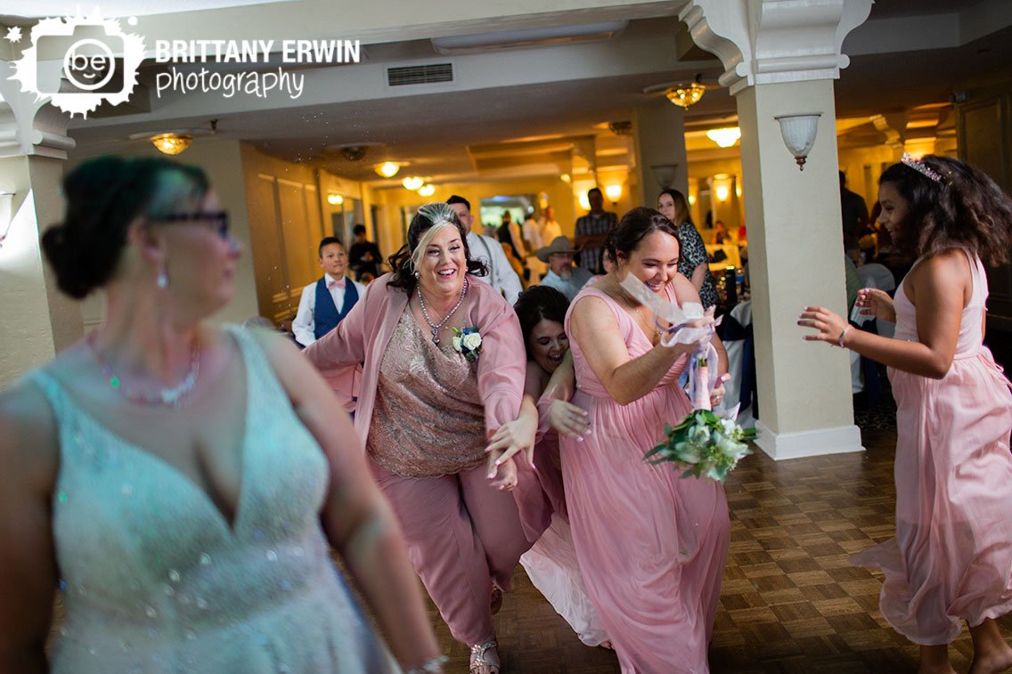 Indianapolis-wedding-photographer-bride-bouquet-toss-bridesmaids-catching.jpg