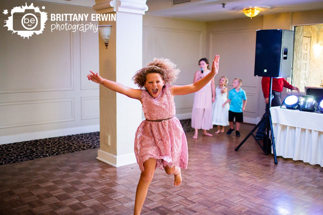 Indianapolis-wedding-photographer-girl-jumping-dance-floor.jpg