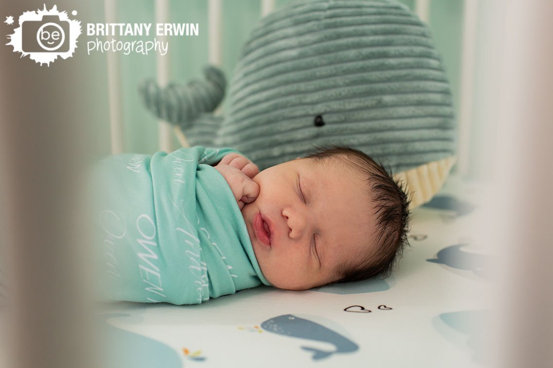 Indianapolis-lifestyle-newborn-photographer-baby-boy-wrapped-in-custom-swaddle.jpg