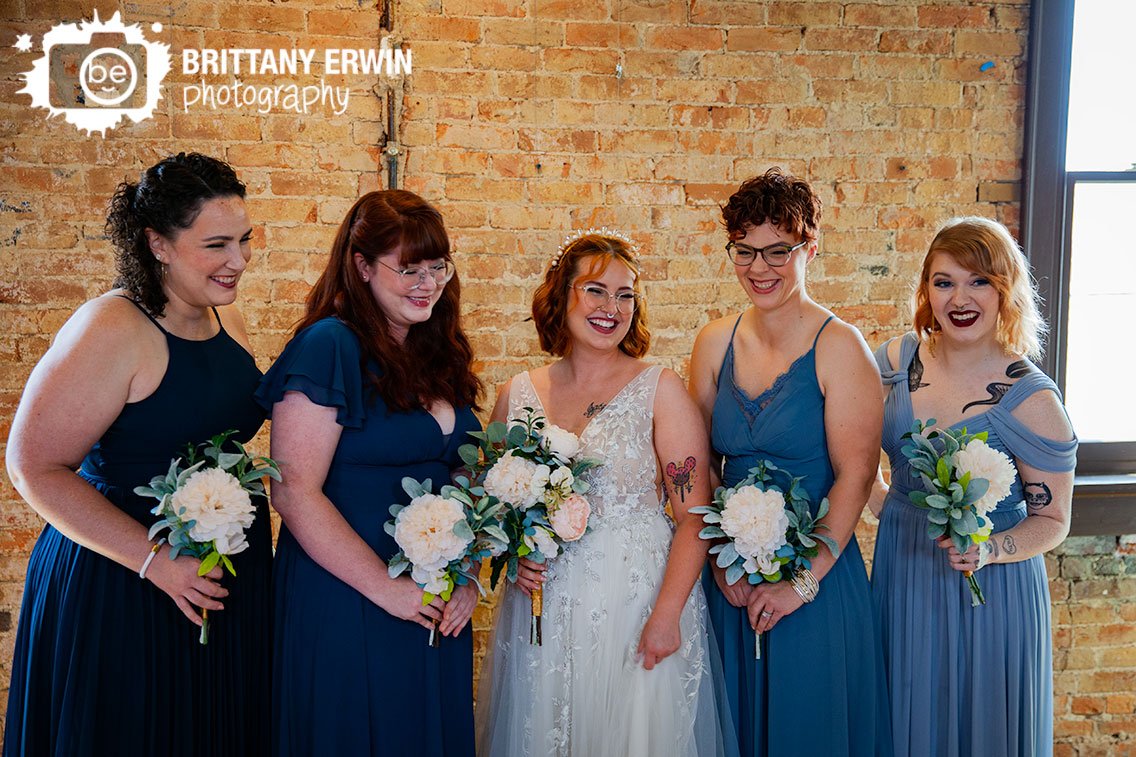 bride-with-bridesmaids-laughing-candid.jpg