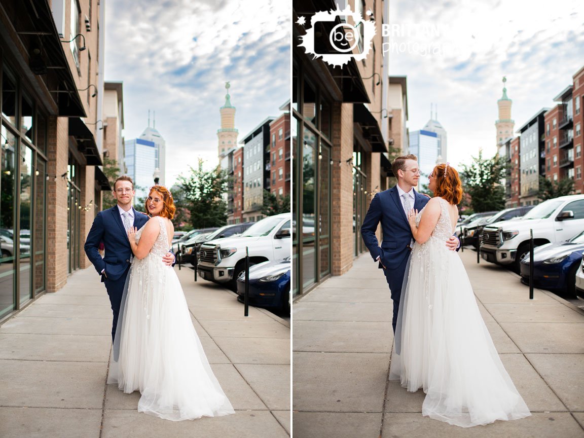 Outdoor-mass-ave-wedding-photographer-couple-on-sidewalk-with-skyscraper-skyline.jpg