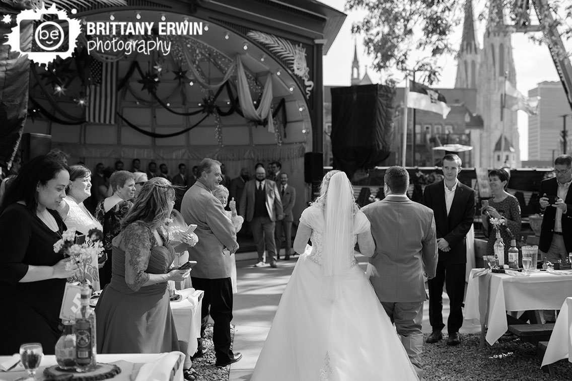 Indianapolis-wedding-photographer-bride-walking-down-aisle-with-brother.jpg