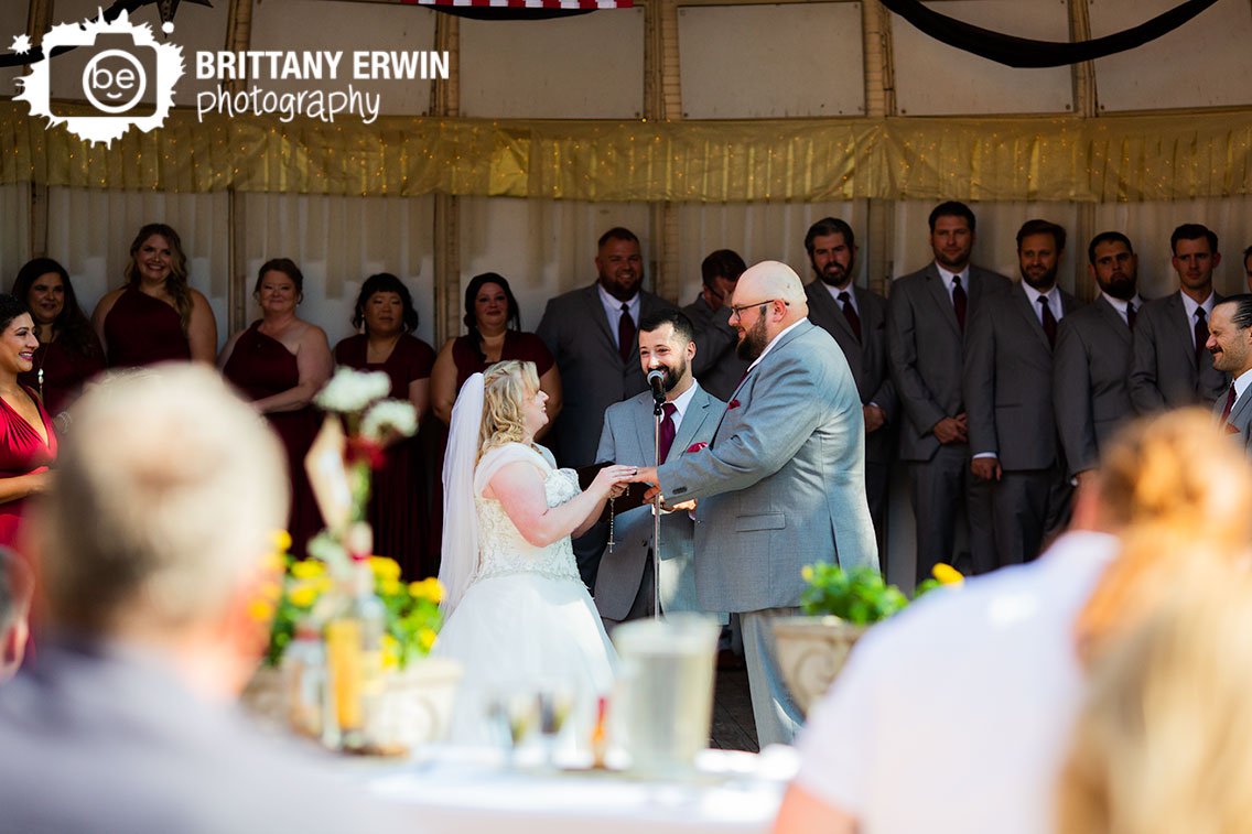 Indianapolis-wedding-photographer-ring-exchange-outdoor-ceremony.jpg