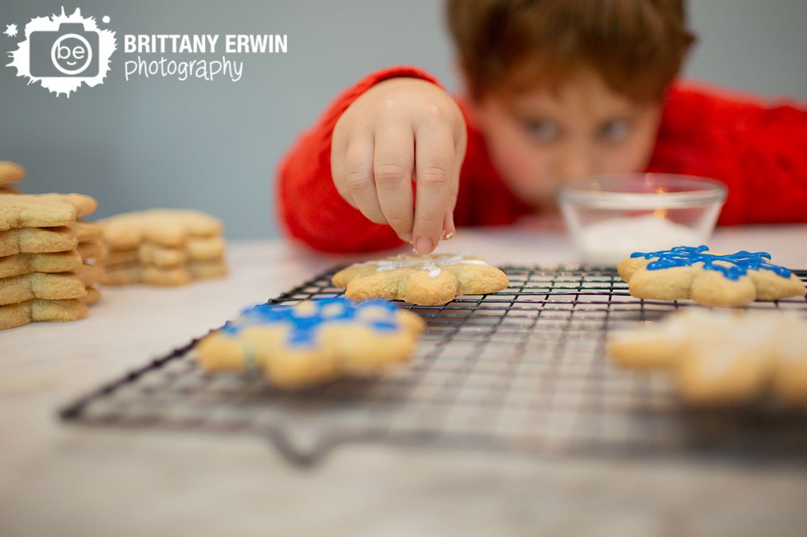 boy-decorating-sugar-cookies-sprinkles-and-icing.jpg