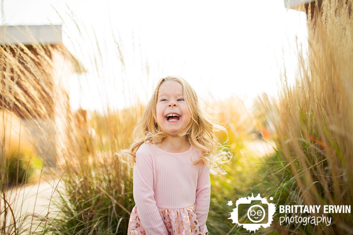 Indianapolis-fall-portrait-photographer-girl-laughing-in-tall-grass.jpg
