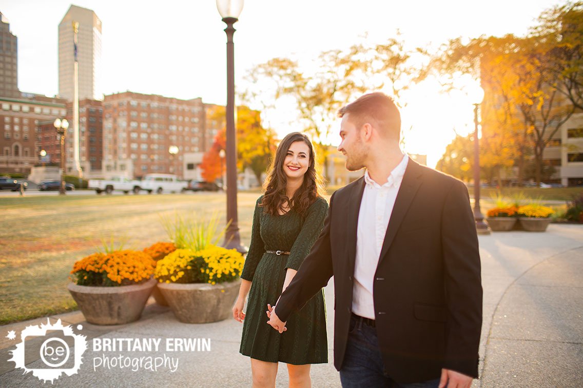 couple-walking-at-sunset-outside-fall-downtown-Indianapolis.jpg