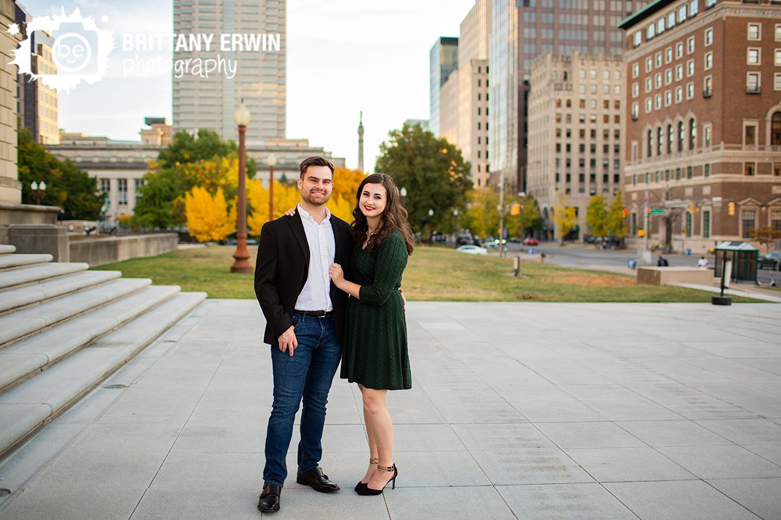 Downtown-Indianapolis-engagement-portrait-photographer-couple-with-skyline-fall-trees.jpg