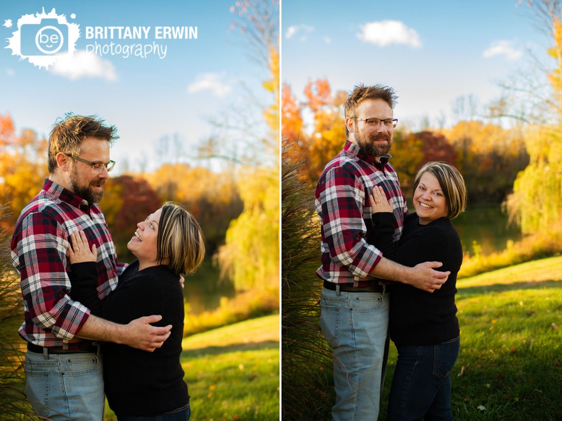 Indianapolis-fall-engagement-portrait-photographer-couple-on-hill-by-pond.jpg