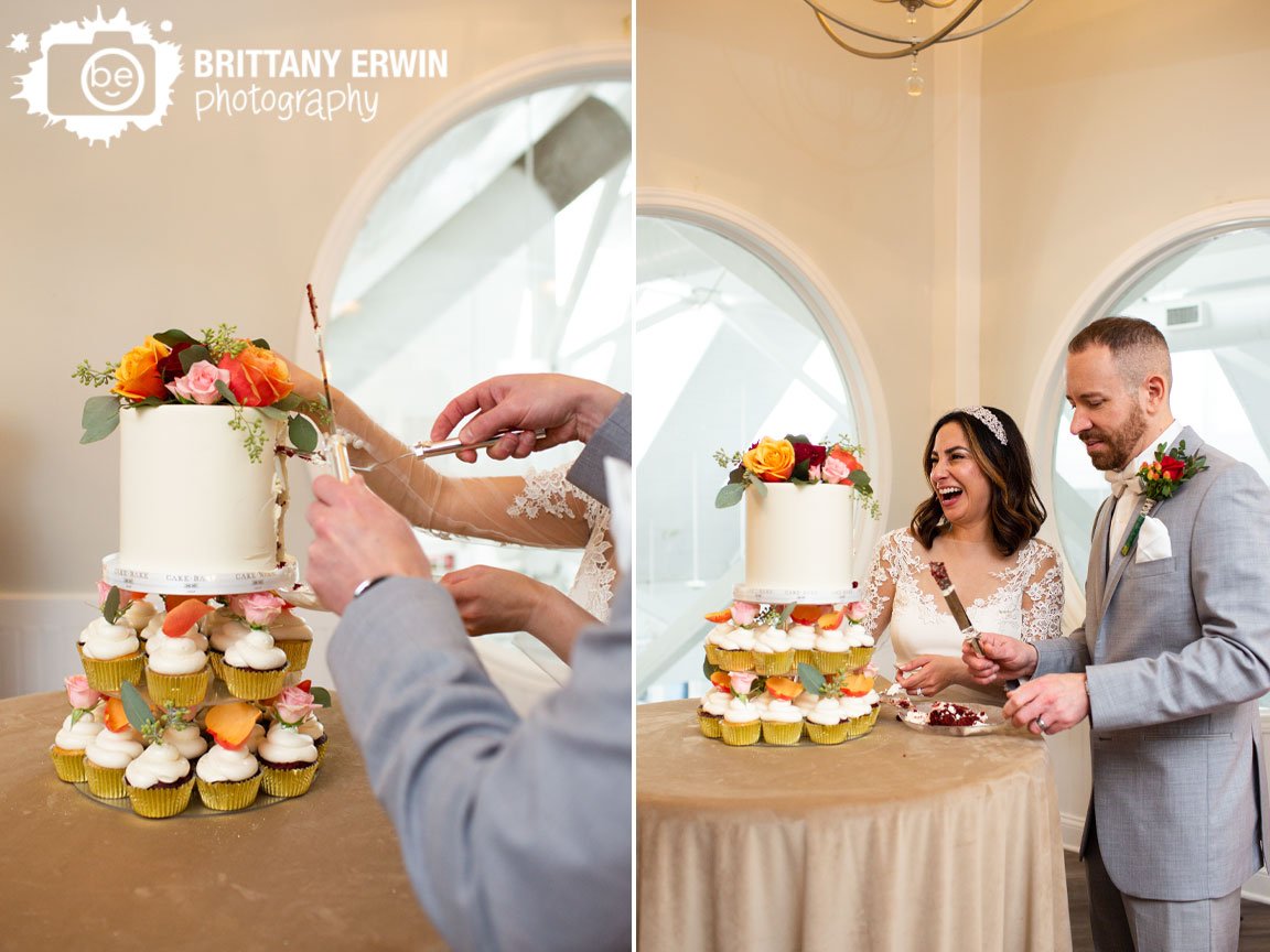 bride-and-groom-laughing-reaction-cutting-cake-weddign-reception-cake-bake-shop.jpg