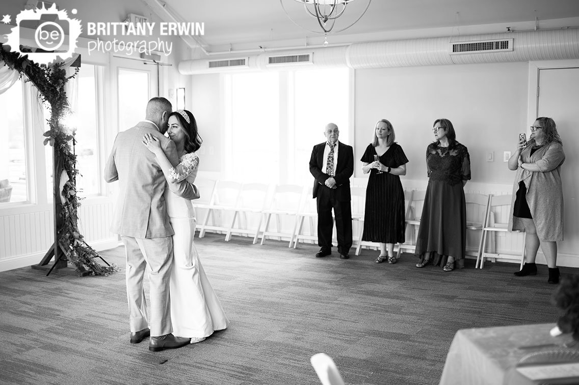 Indianapolis-wedding-reception-photographer-bride-and-groom-first-dance-Ricks-Cafe-Boatyard.jpg