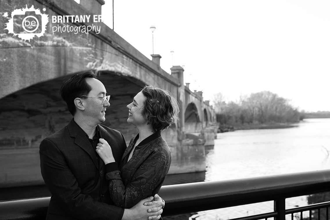 downtown-Indianapolis-engagement-portrait-couple-by-bridge-winter-white-river-park.jpg