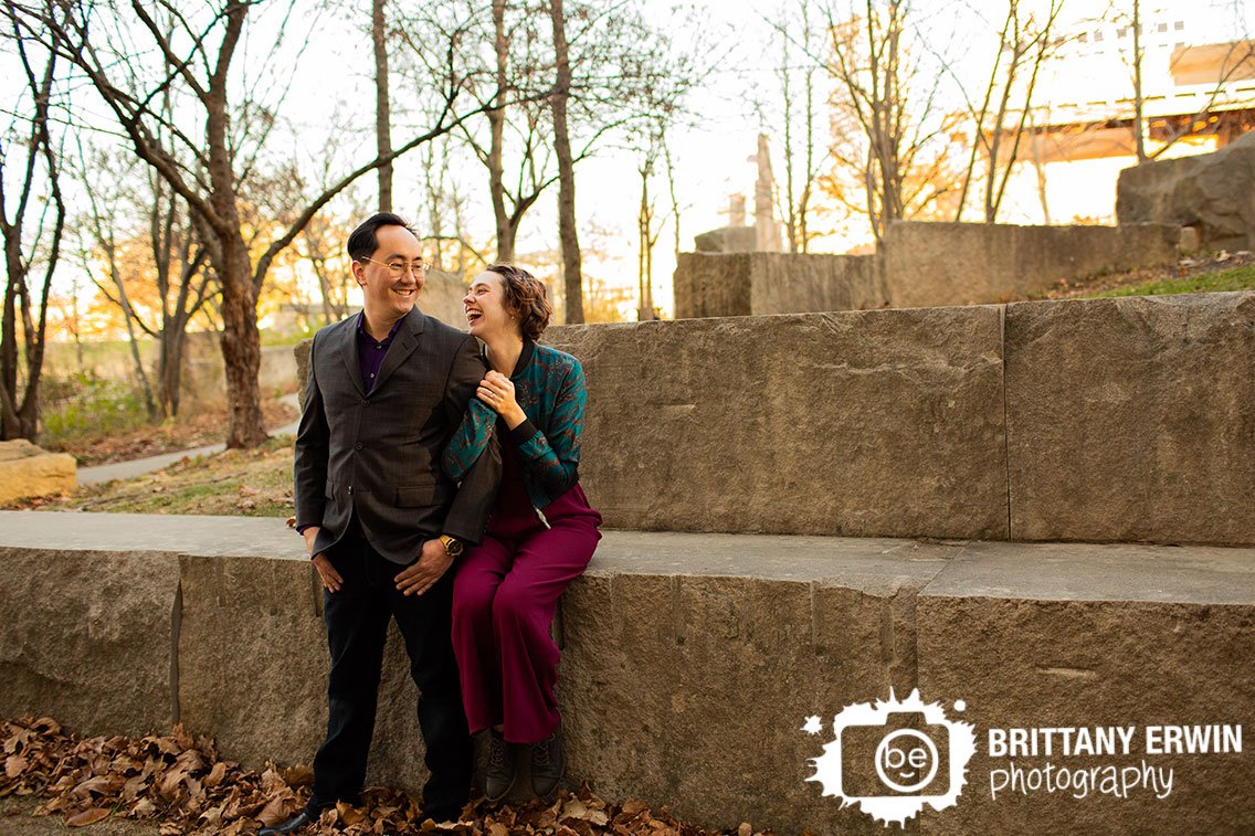 Indianapolis-limestone-wall-couple-engagement-laughing-together-outside-winter.jpg