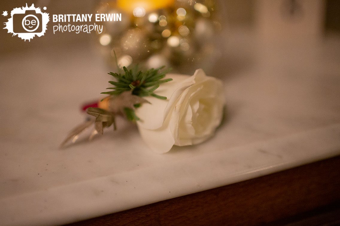 flower-detail-photo-rose-boutonniere-on-marble-top.jpg