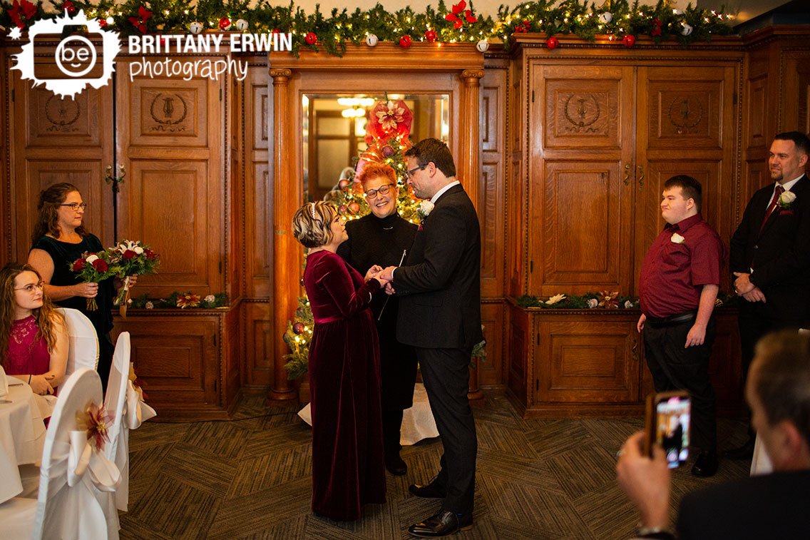 Indianapolis-indoor-wedding-ceremony-ring-exchange-couple-with-Marry-Me-in-Indy.jpg