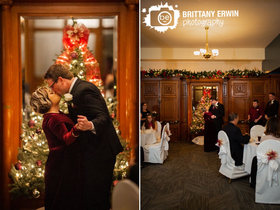 Indianapolis-indoor-winter-wedding-ceremony-Rathskeller-first-kiss-couple-with-Christmas-Tree.jpg