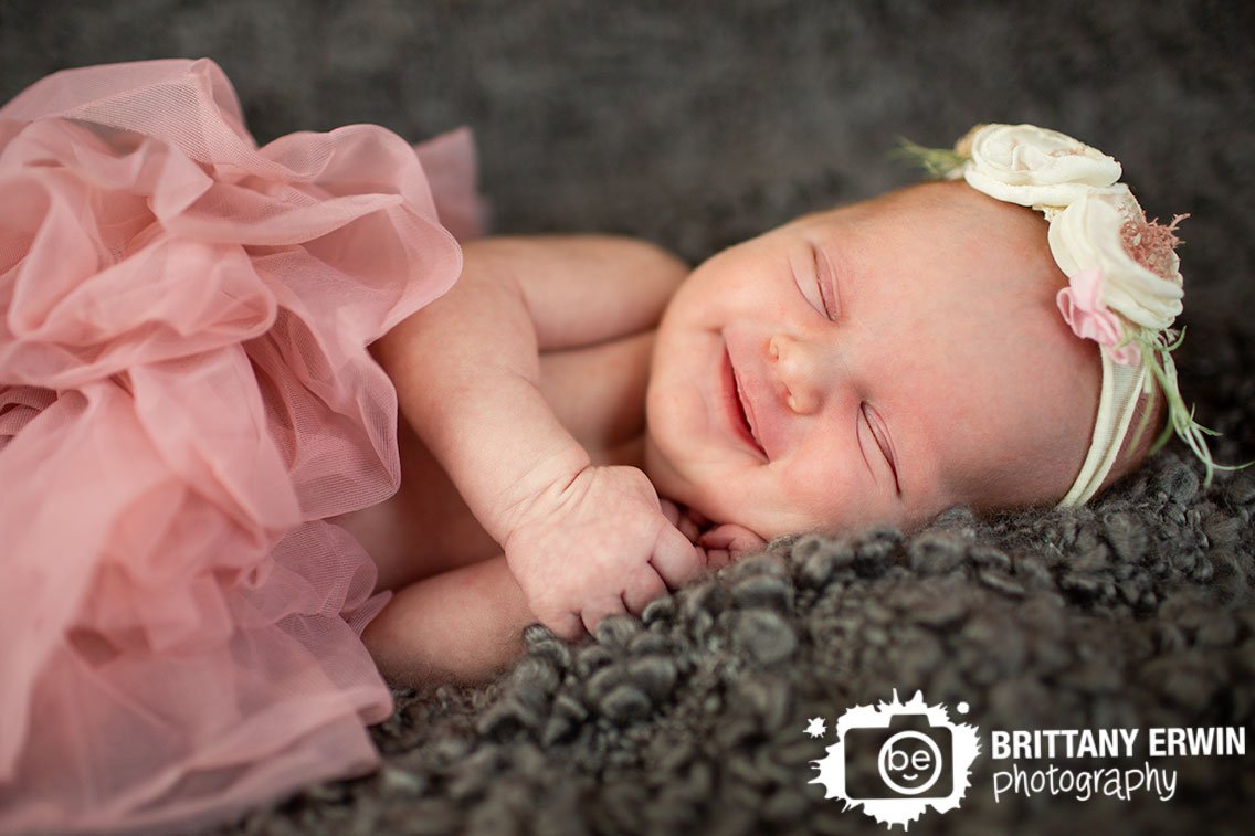 Indianapolis-newborn-portrait-photographer-baby-girl-pink-tutu-smiling-sleeping.jpg