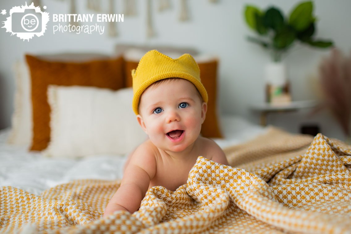 baby-boy-with-knit-yellow-crown-on-bed-Brittany-Erwin-Photography.jpg