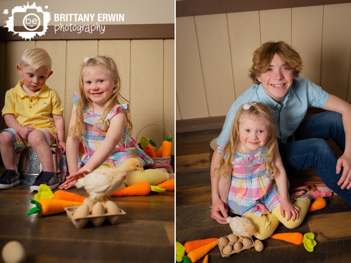 Indianapolis-spring-portrait-photographer-siblings-with-baby-chick-on-wooden-eggs.jpg