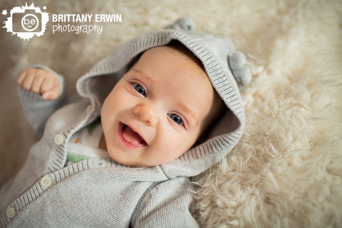 Indianapolis-in-home-milestone-portrait-photographer-baby-girl-in-knit-sweater-with-ears.jpg