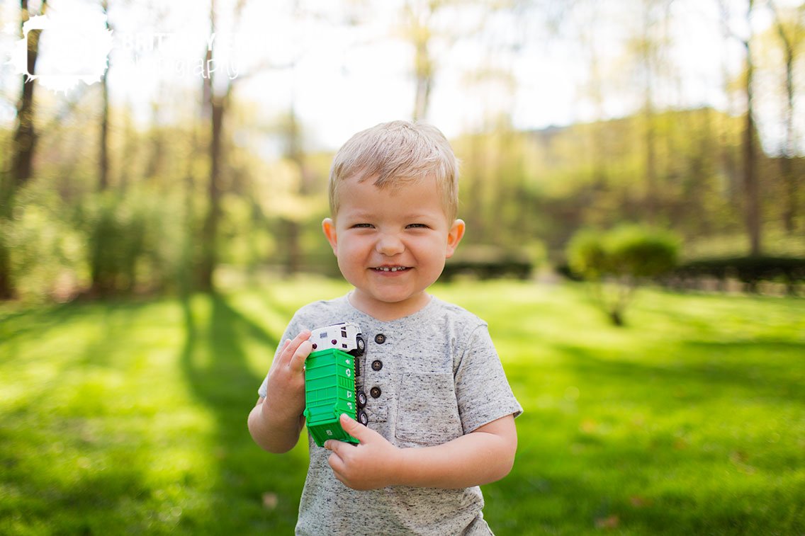 Indianapolis-spring-portrait-photographer-boy-with-truck-outside.jpg