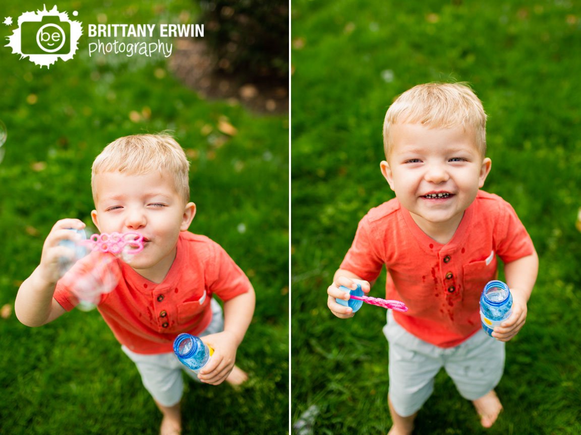 Indianapolis-portrait-photographer-boy-playing-with-bubbles-laughing-spring-outside.jpg